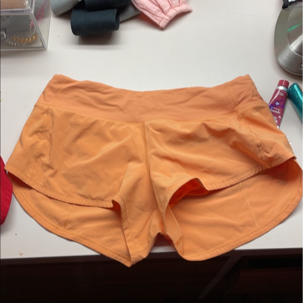 Orange lululemon speed up shorts